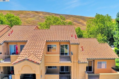 Discover serene living in this top-floor unit, offering stunning on Canyon Lakes Country Club in California - for sale on GolfHomes.com, golf home, golf lot