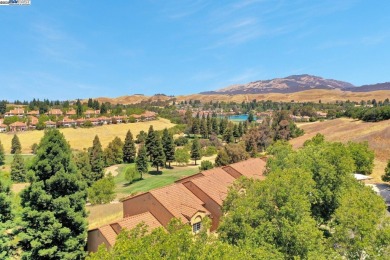 Discover serene living in this top-floor unit, offering stunning on Canyon Lakes Country Club in California - for sale on GolfHomes.com, golf home, golf lot