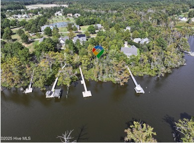 Discover the perfect waterfront homesite in the prestigious on Sound Golf Links at Albemarle Plantation in North Carolina - for sale on GolfHomes.com, golf home, golf lot