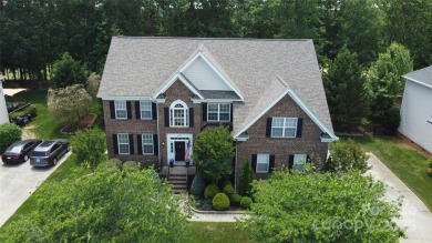 Exquisite residence located in the tranquil Olde Sycamore golf on Olde Sycamore Golf Plantation in North Carolina - for sale on GolfHomes.com, golf home, golf lot
