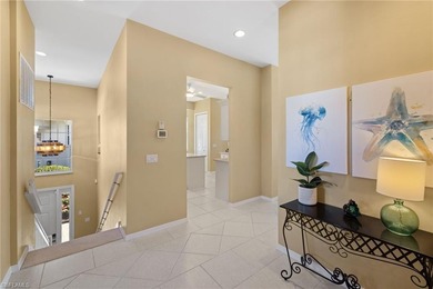 This spacious, well-designed second-floor end-unit is located in on Windstar on Naples Bay in Florida - for sale on GolfHomes.com, golf home, golf lot