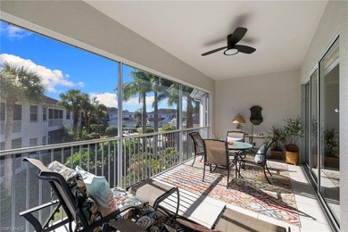 This spacious, well-designed second-floor end-unit is located in on Windstar on Naples Bay in Florida - for sale on GolfHomes.com, golf home, golf lot