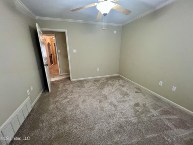 Nestled within the serene and sought-after golf course community on Cherokee Valley Golf Course in Mississippi - for sale on GolfHomes.com, golf home, golf lot