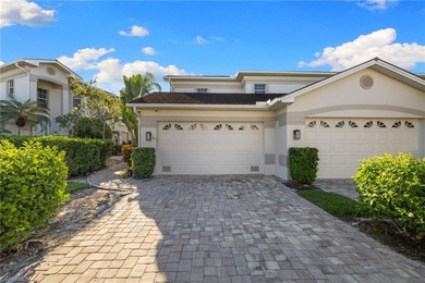 This spacious, well-designed second-floor end-unit is located in on Windstar on Naples Bay in Florida - for sale on GolfHomes.com, golf home, golf lot