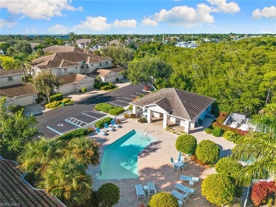 This spacious, well-designed second-floor end-unit is located in on Windstar on Naples Bay in Florida - for sale on GolfHomes.com, golf home, golf lot