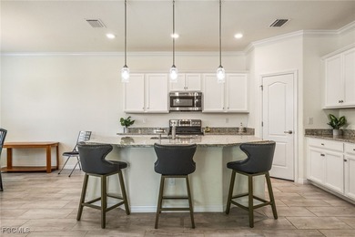 LIKE-NEW Roma Model home offering a bright, OPEN-CONCEPT DESIGN on Pelican Preserve Golf Club in Florida - for sale on GolfHomes.com, golf home, golf lot