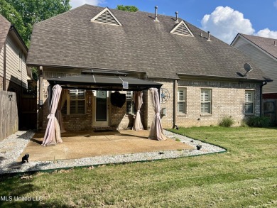 Nestled within the serene and sought-after golf course community on Cherokee Valley Golf Course in Mississippi - for sale on GolfHomes.com, golf home, golf lot