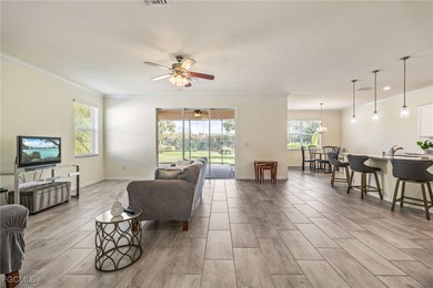 LIKE-NEW Roma Model home offering a bright, OPEN-CONCEPT DESIGN on Pelican Preserve Golf Club in Florida - for sale on GolfHomes.com, golf home, golf lot