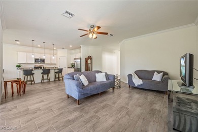 LIKE-NEW Roma Model home offering a bright, OPEN-CONCEPT DESIGN on Pelican Preserve Golf Club in Florida - for sale on GolfHomes.com, golf home, golf lot