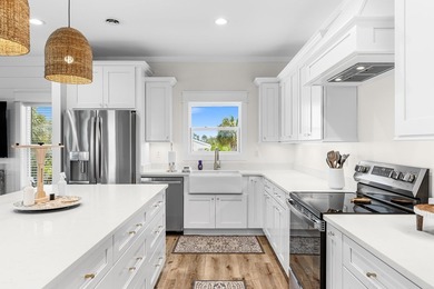 Welcome to 112 35th Street, a brand-new 2025-built home on  in Florida - for sale on GolfHomes.com, golf home, golf lot