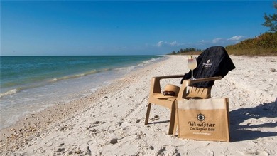 This spacious, well-designed second-floor end-unit is located in on Windstar on Naples Bay in Florida - for sale on GolfHomes.com, golf home, golf lot