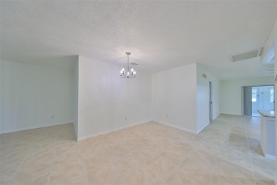 Under contract-accepting backup offers. One or more photo(s) has on Caloosa Greens Executive Golf Course in Florida - for sale on GolfHomes.com, golf home, golf lot