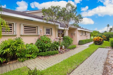 This meticulously updated home combines timeless elegance with on Fountains Golf and Country Club in Florida - for sale on GolfHomes.com, golf home, golf lot