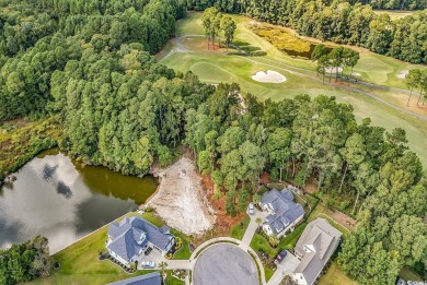 This beautiful direct golf course lot on a cul de sac is located on Wild Wing Plantation in South Carolina - for sale on GolfHomes.com, golf home, golf lot