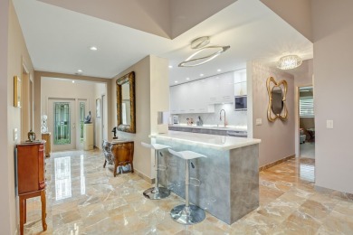 This meticulously updated home combines timeless elegance with on Fountains Golf and Country Club in Florida - for sale on GolfHomes.com, golf home, golf lot