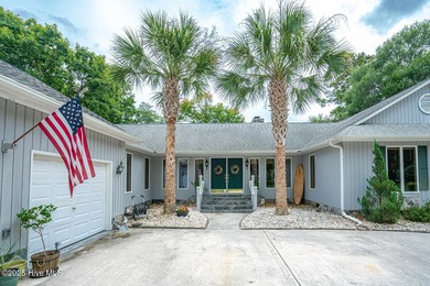 Spacious Coastal Retreat with Sunroom & Outdoor Entertaining on Brick Landing Plantation Yacht and Golf Club in North Carolina - for sale on GolfHomes.com, golf home, golf lot