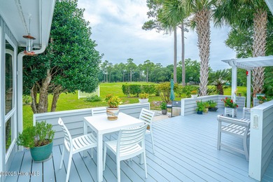 Spacious Coastal Retreat with Sunroom & Outdoor Entertaining on Brick Landing Plantation Yacht and Golf Club in North Carolina - for sale on GolfHomes.com, golf home, golf lot