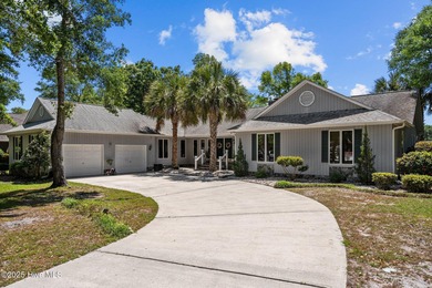 Spacious Coastal Retreat with Sunroom & Outdoor Entertaining on Brick Landing Plantation Yacht and Golf Club in North Carolina - for sale on GolfHomes.com, golf home, golf lot