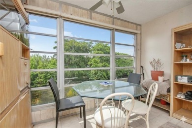 Wake up to tranquil water views in this stunning 2-bedroom on Sunrise Lakes Phase III in Florida - for sale on GolfHomes.com, golf home, golf lot