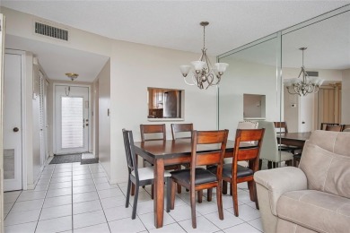 Wake up to tranquil water views in this stunning 2-bedroom on Sunrise Lakes Phase III in Florida - for sale on GolfHomes.com, golf home, golf lot