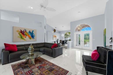 Find your sanctuary in a home where stunning lake views provide on Misty Creek Country Club in Florida - for sale on GolfHomes.com, golf home, golf lot