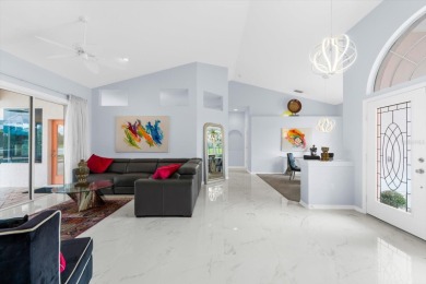 Find your sanctuary in a home where stunning lake views provide on Misty Creek Country Club in Florida - for sale on GolfHomes.com, golf home, golf lot