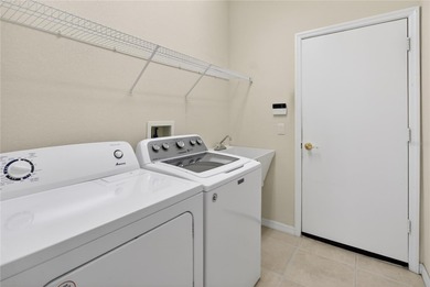 Welcome to 267 Heritage Isles Way, a large 3-bedroom, 2-bathroom on River Strand Golf and Country Club At Heritage Harbour  in Florida - for sale on GolfHomes.com, golf home, golf lot