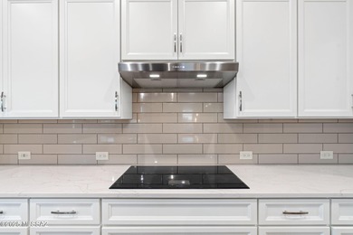 This exceptional 2024 residence presents 3 bedrooms, 2.5 baths on Quail Creek Country Club  in Arizona - for sale on GolfHomes.com, golf home, golf lot