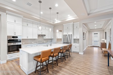 This exceptional 2024 residence presents 3 bedrooms, 2.5 baths on Quail Creek Country Club  in Arizona - for sale on GolfHomes.com, golf home, golf lot