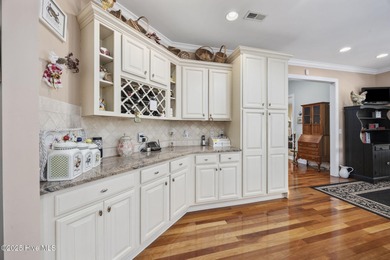 Step into 420 Cypress Ridge Dr SE and be prepared to fall in on Carolina National Golf Club in North Carolina - for sale on GolfHomes.com, golf home, golf lot