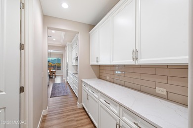 This exceptional 2024 residence presents 3 bedrooms, 2.5 baths on Quail Creek Country Club  in Arizona - for sale on GolfHomes.com, golf home, golf lot