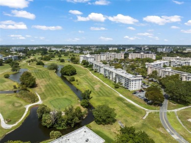 Stunning condo with expansive views of the golf course on Palm-Aire Country Club and Resort - Palms in Florida - for sale on GolfHomes.com, golf home, golf lot