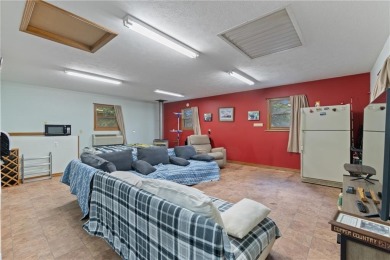 Set on a gently sloping, beautifully landscaped lot in a quiet on Holiday Island Executive Golf Course in Arkansas - for sale on GolfHomes.com, golf home, golf lot