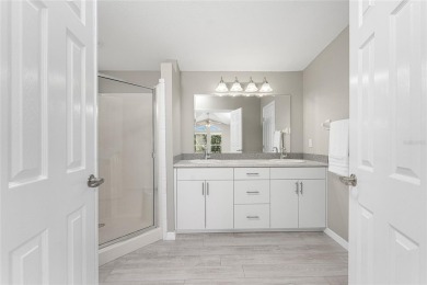 Live the good life at The Pines of Sandalhaven, a serene 55+ on Lemon Bay Golf Club in Florida - for sale on GolfHomes.com, golf home, golf lot
