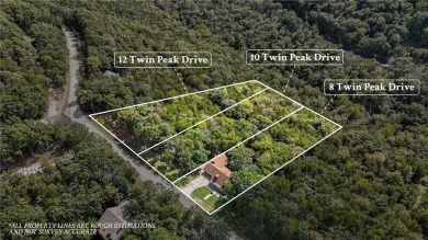 Set on a gently sloping, beautifully landscaped lot in a quiet on Holiday Island Executive Golf Course in Arkansas - for sale on GolfHomes.com, golf home, golf lot