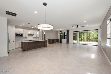 Over $150,000 in upgrades and custom additions make this 2023 on River Hall Country Club in Florida - for sale on GolfHomes.com, golf home, golf lot