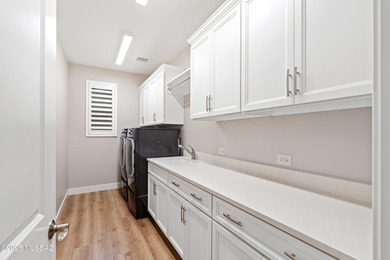 This exceptional 2024 residence presents 3 bedrooms, 2.5 baths on Quail Creek Country Club  in Arizona - for sale on GolfHomes.com, golf home, golf lot