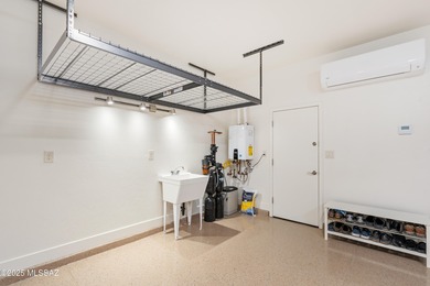 This exceptional 2024 residence presents 3 bedrooms, 2.5 baths on Quail Creek Country Club  in Arizona - for sale on GolfHomes.com, golf home, golf lot