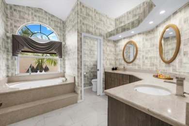 Find your sanctuary in a home where stunning lake views provide on Misty Creek Country Club in Florida - for sale on GolfHomes.com, golf home, golf lot