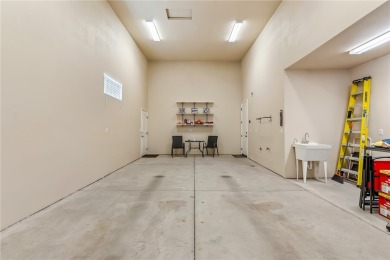 This exquisite RV garage home is conveniently located within the on Chaparral Golf and Country Club in Arizona - for sale on GolfHomes.com, golf home, golf lot