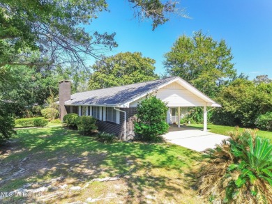Welcome to this inviting brick ranch-style home perfectly on Sunkist Country Club, Inc. in Mississippi - for sale on GolfHomes.com, golf home, golf lot