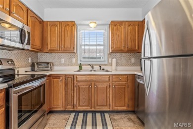 Discover easy lake living in this charming 2-bedroom, 2-bath on Terre Du Lac Golf and Country Club in Missouri - for sale on GolfHomes.com, golf home, golf lot