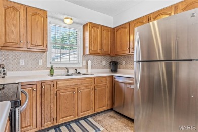 Discover easy lake living in this charming 2-bedroom, 2-bath on Terre Du Lac Golf and Country Club in Missouri - for sale on GolfHomes.com, golf home, golf lot