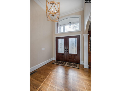 Welcome to luxury living on the 4th green of the prestigious on Golden Hills Golf and Country Club in South Carolina - for sale on GolfHomes.com, golf home, golf lot