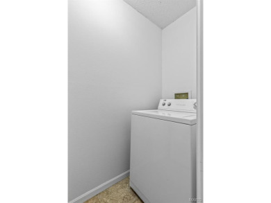 Discover easy lake living in this charming 2-bedroom, 2-bath on Terre Du Lac Golf and Country Club in Missouri - for sale on GolfHomes.com, golf home, golf lot