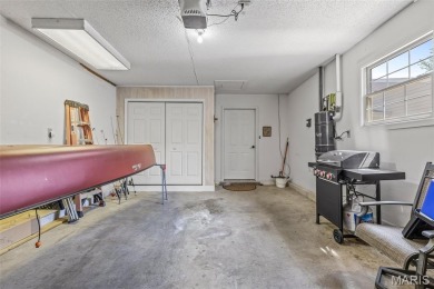 Discover easy lake living in this charming 2-bedroom, 2-bath on Terre Du Lac Golf and Country Club in Missouri - for sale on GolfHomes.com, golf home, golf lot