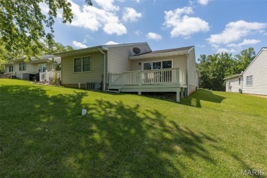 Discover easy lake living in this charming 2-bedroom, 2-bath on Terre Du Lac Golf and Country Club in Missouri - for sale on GolfHomes.com, golf home, golf lot