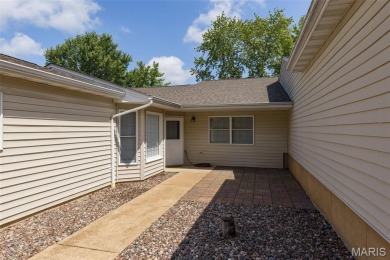 Discover easy lake living in this charming 2-bedroom, 2-bath on Terre Du Lac Golf and Country Club in Missouri - for sale on GolfHomes.com, golf home, golf lot