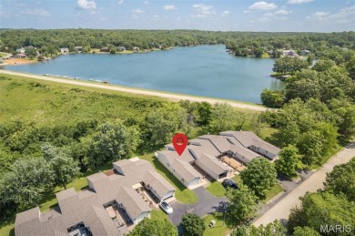 Discover easy lake living in this charming 2-bedroom, 2-bath on Terre Du Lac Golf and Country Club in Missouri - for sale on GolfHomes.com, golf home, golf lot