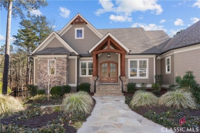 Discover the epitome of luxury living in this exquisite estate on Reynolds Lake Oconee - The Oconee in Georgia - for sale on GolfHomes.com, golf home, golf lot